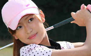 Far eastern golf kitten wears shirt and skirt but dislikes panties and flashes muff