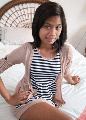 Gorgeous Asian babe takes off a striped dress in exchange for some money