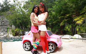 Black gal in pink headb& & lesbo buddy have fun by Cadillac Escalade dong