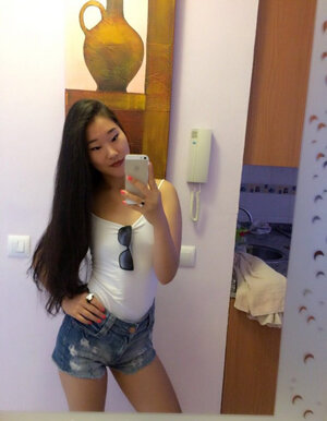 Slutty Spaniard with oriental features rushes to expose herself on verge of porn