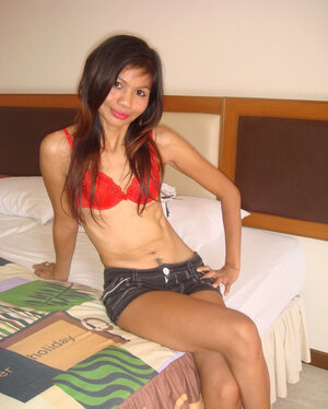 Skinny Thai girl poses for lad after taking off clothes and red underwear