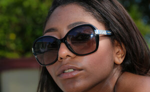 Yummy ebony puts her armpits up and besides shows her nice titties