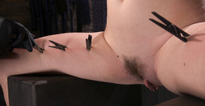 Her eyes are prominent and also penetrating as she gets tortured