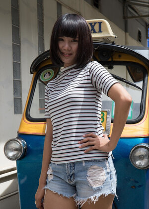 Lovely 18-19 year old with a bob haircut strips to show her tight butt