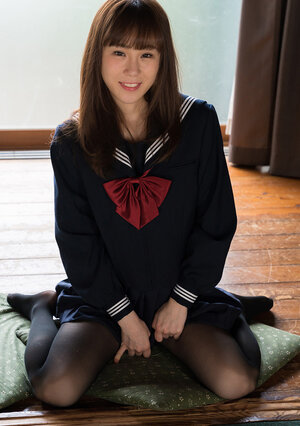 Undersized Japanese schoolgirl unclothes to show off her sexy body