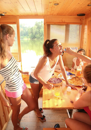 Ana Bell Evans and also Antonia Sainz indulge in toy play with their friends on a boat on the river