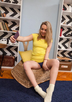 Blonde 18-19 y.o. Danielle Rose getting undressed and additionally spreading her legs