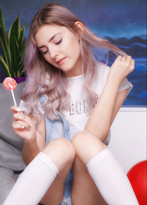 Eva Elfie enjoys undressing to her socks and furthermore toying her bald cum bucket