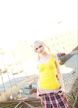 Lacey Lust strips and furthermore fingers her pussy for a hardcore photo shoot