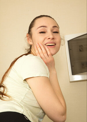 Nice-looking Macy Ssens gets naked to satisfy her cunt on a bicycle