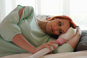 Redheaded chick with oily jugs is going to use a dildo to climax